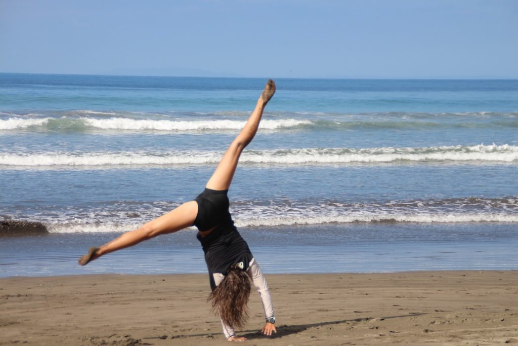 Girl dancing at the beach